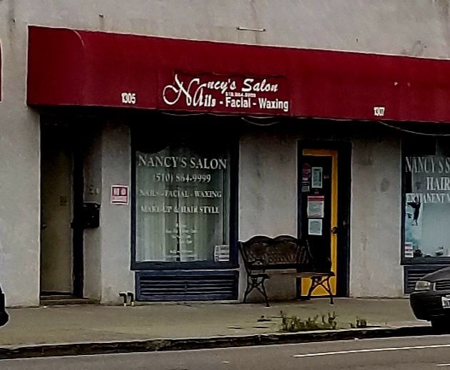 The Nancy’s Salon storefront on Lincoln Avenue, with its burgundy awning